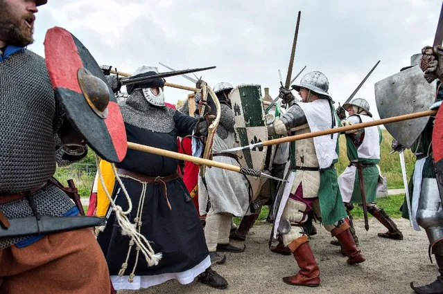 Participants in medieval costumes charge during the European Championship in Knight Joust at the Spoettrup medieval castle in Denmark, July 25, 2016. (Photo by Henning Bagger/Reuters/Scanpix Denmark)