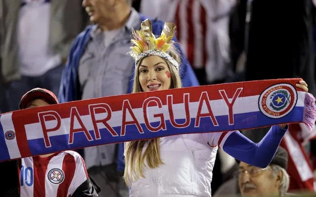 A fan waits for the start of the 2018 World Cup qualifying soccer match between Argentina and Paraguay at the Defensores del Chaco stadium in Asuncion, Paraguay, October 13, 2015. (Photo by Jorge Adorno/Reuters)