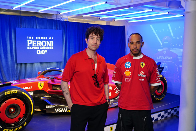 Lewis Hamilton with Nick Grimshaw on Wednesday, July 2, 2025 at The House of Peroni Nastro Azzurro 0.0% event, a multi-day racing-inspired pop-up in London's Covent Garden, taking place ahead of this weekend's British Grand Prix. Celebrating the partnership between the alcohol-free drink Peroni Nastro Azzurro 0.0% and Scuderia Ferrari HP, the experience will be open to the public from July 3-5. (Photo by Ian West/PA Media Assignments)