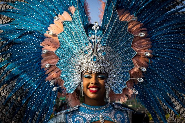 A participant poses during the Macau International Parade in Macau on March 24, 2024. (Photo by Eduardo Leal/AFP Photo)