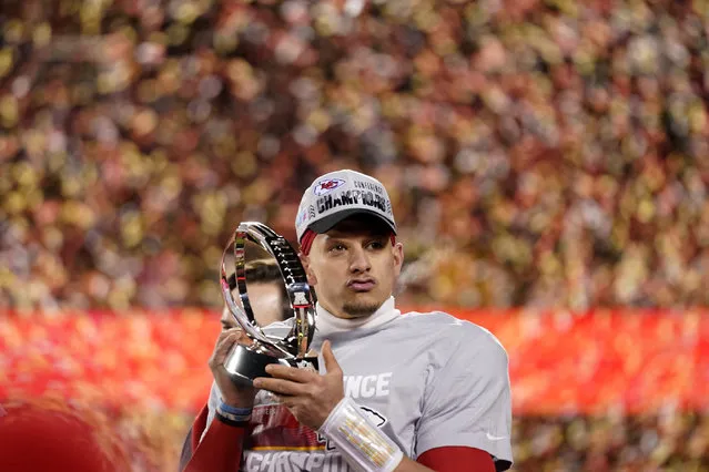 Kansas City Chiefs quarterback Patrick Mahomes holds the Lamar Hunt Trophy after the NFL AFC Championship playoff football game against the Cincinnati Bengals, Sunday, January 29, 2023, in Kansas City, Mo. The Chiefs won 23-20. (Photo by Brynn Anderson/AP Photo)