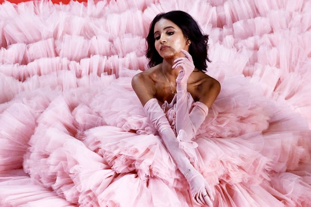 A guest poses on the red carpet during arrivals for the screening of the film “Oh Canada” in competition at the 77th Cannes Film Festival in Cannes, France, on May 17, 2024. (Photo by Yara Nardi/Reuters)
