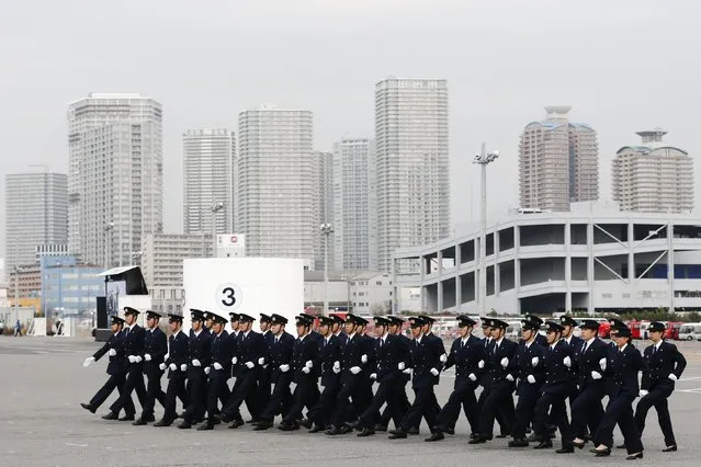 Members of the Tokyo fire brigade march during a New Year presentation in Tokyo January 6, 2015. (Photo by Thomas Peter/Reuters)