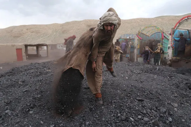 A Pakistani miner works at a coal mine, on the International Workers' Day, in Quetta, Pakistan, 01 May 2023. Labor Day or May Day is an annual holiday that takes place on 01 May, it celebrates laborers, their rights, achievements and contributions to society. (Photo by Fayyaz Ahmad/EPA/EFE)