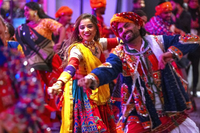 Indian dancers perform for delegates after Ahmedabad is officially announced as the host city during the 2030 Commonwealth Games Host Announcement at the Hilton Glasgow, UK on Wednesday, November 26, 2025. (Photo by Jane Barlow/PA Wire)