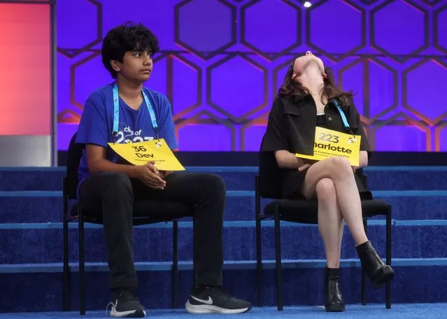 Charlotte Walsh, 14, tosses her head back after she made it to the next round during the final of the Scripps National Spelling Bee competition in National Harbor, Maryland U.S., June 1, 2023. (Photo by Leah Millis/Reuters)