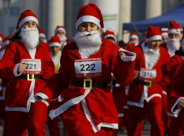 People dressed as Santa Claus run during a race in Skopje, Macedonia December 27, 2015. (Photo by Ognen Teofilovski/Reuters)