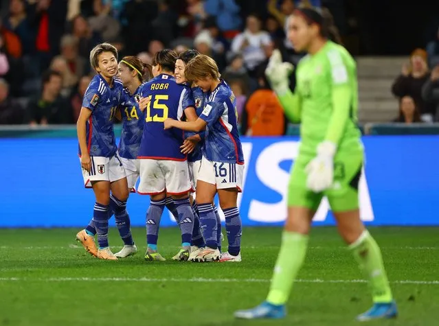 Hikaru Naomoto of Japan celebrates with teammates after scoring her team's first goal during the FIFA Women's World Cup Australia & New Zealand 2023 Group C match between Japan and Costa Rica at Dunedin Stadium on July 26, 2023 in Dunedin, New Zealand. (Photo by Molly Darlington/Reuters)