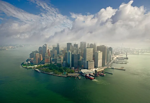 These are the stunning panoramic shots of some of the worlds most beautiful locations. Company AirPano travel the world photographing its wonders from above. Their shots include famous cities – such as New York, Paris and Barcelona – as well as natural marvels, like volcanoes and waterfalls. Here: Downtown Manhattan, New York. (Photo by Airpano/Caters News)