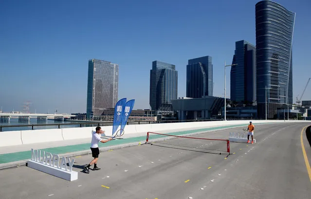 Andy Murray of Great Britain hits a return to Rafeal Nadal of Spain during the offical players launch of 2016 Mubadala Tennis Championship at Al Maryah Island on December 28, 2016 in Abu Dhabi, United Arab Emirates. (Photo by Francois Nel/Getty Images)