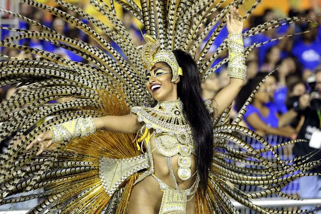 A member of the samba school of the special group Aguia de Ouro performs during a parade of the Carnival of Sao Paulo, in Sao Paulo, Brazil, 06 February 2016. (Photo by Sebastiao Moreira/EPA)