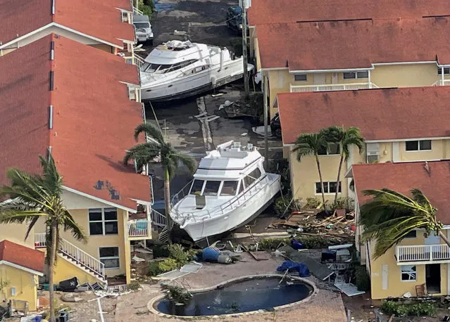 An aerial view of damaged boats and buildings after Hurricane Ian caused widespread destruction in Fort Myers, Florida, U.S., September 29, 2022. (Photo by Shannon Stapleton/Reuters)