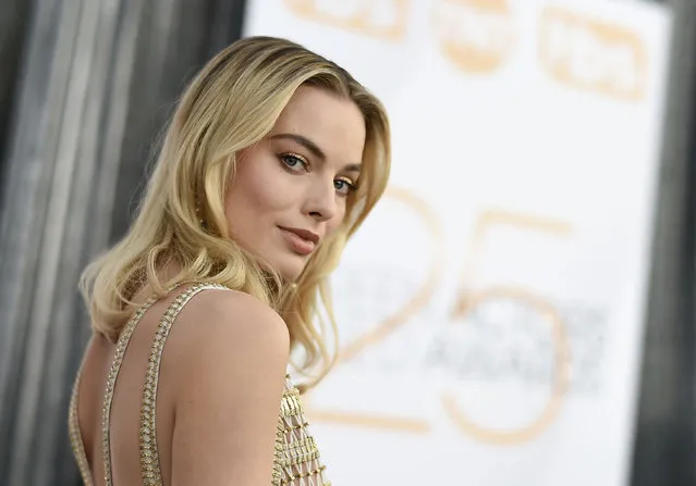Outstanding Performance by a Female Actor in a Supporting Role for “Mary Queen of Scotts” nominee Margot Robbie walks the red carpet at the 25th Annual Screen Actors Guild Awards at the Shrine Auditorium in Los Angeles on January 27, 2019. (Photo by Valérie Macon/AFP Photo)