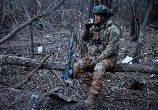 A Ukrainian serviceman from air defence unit of the 93rd Mechanized Brigade rests at his position in a frontline, near the town of Bakhmut, Ukraine, on March 6, 2024. (Photo by Serhii Nuzhnenko/Radio Free Europe/Radio Liberty)