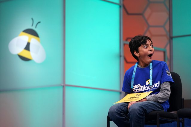 Shrey Parikh, 12, of Rancho Cucamonga, Calif., reacts to a fellow competitor's word during the finals of the Scripps National Spelling Bee, in Oxon Hill, Md., Thursday, May 30, 2024. (Photo by Nathan Howard/AP Photo)