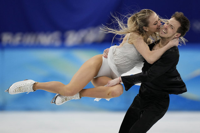 Victoria Sinitsina and Nikita Katsalapov, of the Russian Olympic Committee, perform their routine in the ice dance competition during the figure skating at the 2022 Winter Olympics, Monday, February 14, 2022, in Beijing. (Photo by Bernat Armangue/AP Photo)