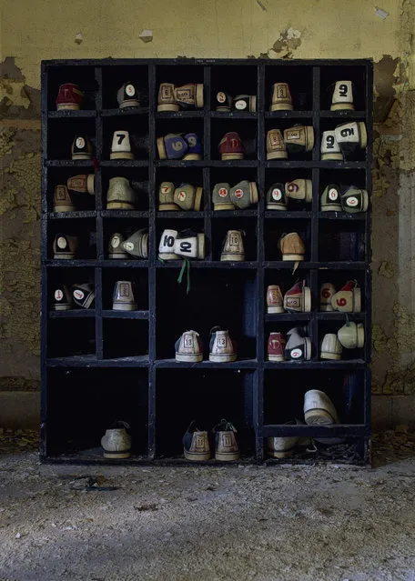 A rack of bowling shoes in a old asylum, New York. “The bowling shoe rack, complete with all the forgotten shoes, was incredible to photograph”. (Photo by Daniel Barter/Caters News)
