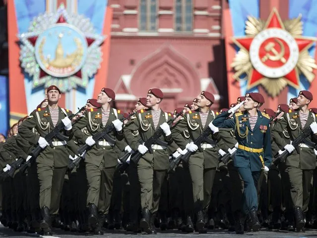 Thousands of Russian troops marched on Red Square in the annual Victory Day parade in a proud display of the nation's military might amid escalating tensions over Ukraine. (Photo by Pavel Golovkin/AP Photo)