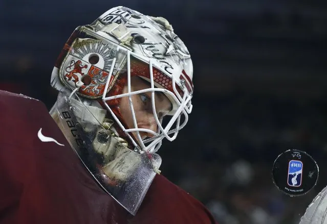 Goalkeeper Elvis Merzlikins of Latvia looks at the puck at the 2017 IIHF World Championships in Cologne, Germany on May 13, 2017. (Photo by Wolfgang Rattay/Reuters)