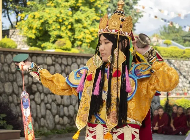 In this photo provided by the Dongyu Gatsal Ling nunnery, a Dakini dancer in full attire performs movements of the ritual dance at the nunnery in the state of Himachal Pradesh, India on October 27, 2021. Women were included in Buddhism since its earliest years, and their monastic ordination dates back more than 2,500 years, said Judith Simmer-Brown, emeritus professor of contemplative and religious studies at Colorado’s Naropa University. But as monasticism spread from India to other countries, there often were extra requirements to become ordained in those patriarchal societies. (Photo by Dongyu Gatsal Ling nunnery via AP Photo)
