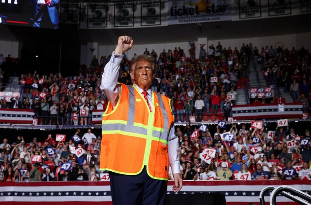 Republican presidential nominee and former U.S. President Donald Trump gestures during his campaign rally, in Green Bay, Wisconsin, U.S., October 30, 2024. (Photo by Brendan McDermid/Reuters)