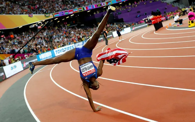 US athlete Dawn Harper Nelson celebrates coming second and winning silver in the final of the women' s 100 m hurdles athletics event at the 2017 IAAF World Championships at the London Stadium in London on August 12, 2017. (Photo by Kai Pfaffenbach/Reuters)