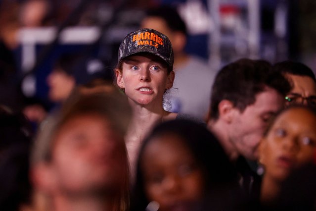 An attendee reacts to early election results at Kamala Harris's election night rally at Howard University, in Washington on November 6, 2024. (Photo by Hannah McKay/Reuters)