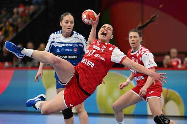 Croatia's pivot #17 Katarina Jezic jumps to shoot during the women's EHF 2024 European championship handball game between Croatia and Faroe Islands at the St Jakobshalle in Basel on December 1, 2024. (Photo by Fabrice Coffrini/AFP Photo)