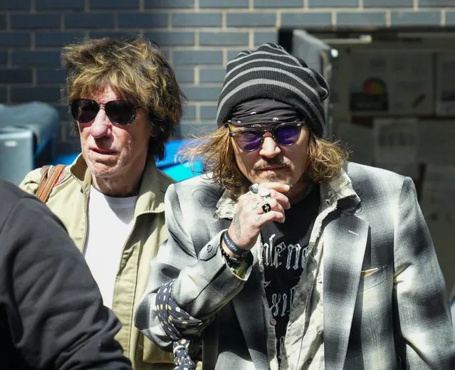 Singer Jeff Beck (L) and actor Johnny Depp leave the Dakota Hotel in Glasgow city centre, Scotland via the back door on June 3, 2022. Depp, who is touring with Jeff Beck and his band, will play at the Glasgow Royal concert Hall tonight. (Photo by Stuart Wallace/Rex Features/Shutterstock)