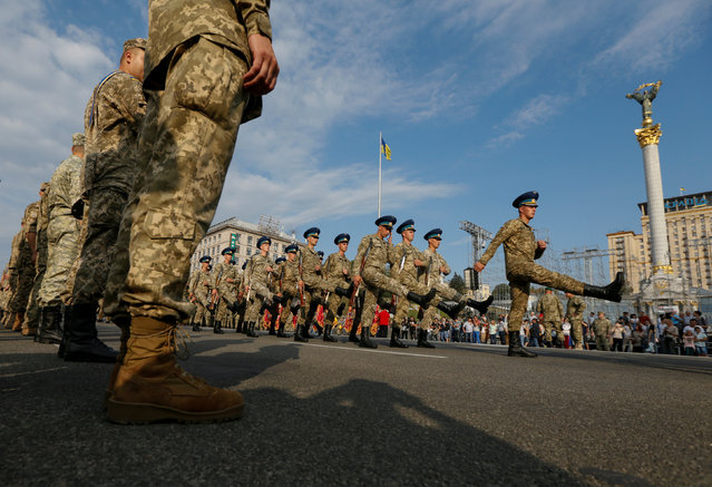 Ukrainian servicemen take part in a rehearsal for the Independence Day military parade in central Kiev, Ukraine, August 19, 2016. (Photo by Valentyn Ogirenko/Reuters)