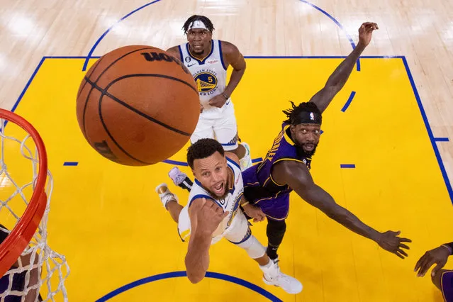 Golden State Warriors guard Stephen Curry shoots the basketball against Los Angeles Lakers guard Patrick Beverley during the second half at Chase Centre in San Francisco on October 18, 2022. (Photo by Kyle Terada/USA TODAY Sports)