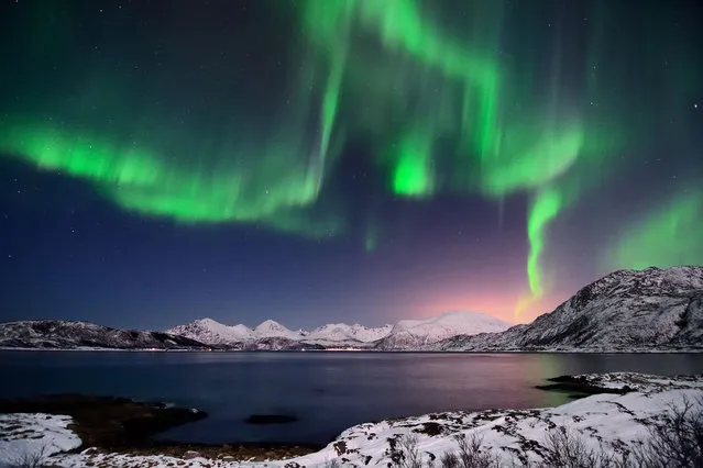 Aurora borealis in Troms, northern Norway. (Photo by John-Hemmingsen/Getty Images)