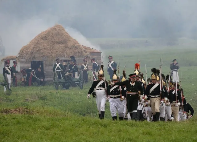 Participants in the military historical reconstruction of the Battle of Borodino during the show in Borodino Field, Moscow Region on September 4, 2016. (Photo by Kirill Kallinikov/Sputnik)