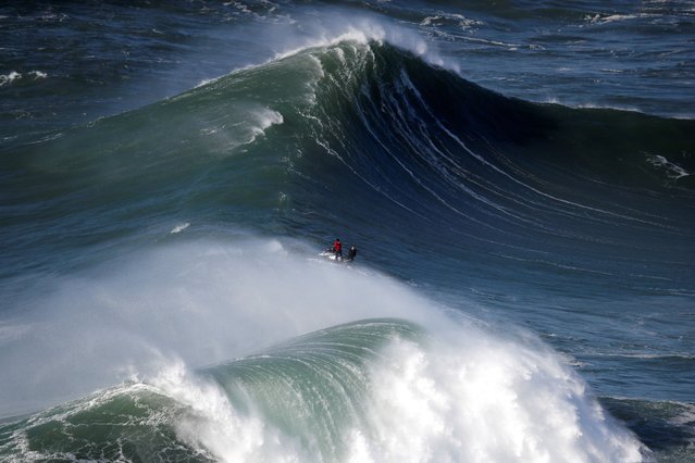 A jet ski is seen in Praia do Norte, Nazare, Portugal on January 9, 2023. (Photo by Pedro Nunes/Reuters)