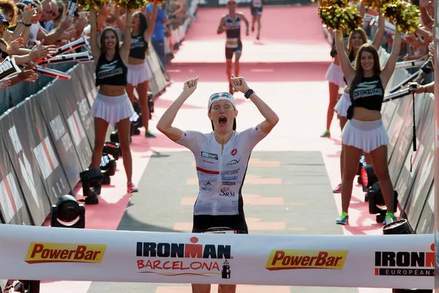 Athlete Astrid Stienen from Germany celebrates winning the women race during Ironman Barcelona on October 2, 2016 in Calella, near Barcelona, Spain. (Photo by Pablo Blazquez Dominguez/Getty Images)