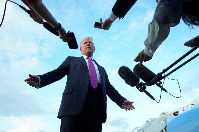 U.S. President Donald Trump speaks to the media before boarding Air Force One to depart for Washington, at Morristown Municipal Airport in Morristown, New Jersey, U.S., September 14, 2025. (Photo by Ken Cedeno/Reuters)