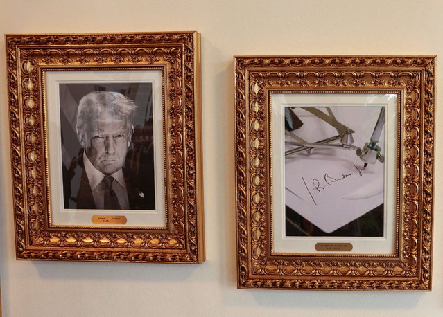 An image of an autopen signing former President Joe Biden's signature is displayed in place of a portrait of Biden next to a portrait of President Donald Trump at the ”Presidential Walk of Fame” along the Colonnade at the White House in Washington, D.C., on September 25, 2025. (Photo by Kevin Lamarque/Reuters)