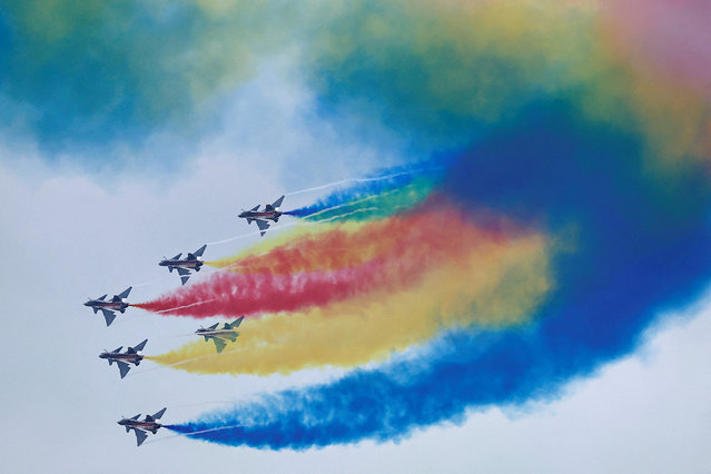 Aircraft of the Chinese People's Liberation Army (PLA) Air Force's Bayi aerobatic team perform at the China International Aviation and Aerospace Exhibition, or Airshow China, in Zhuhai, Guangdong province, China on November 14, 2024. (Photo by Tingshu Wang/Reuters)