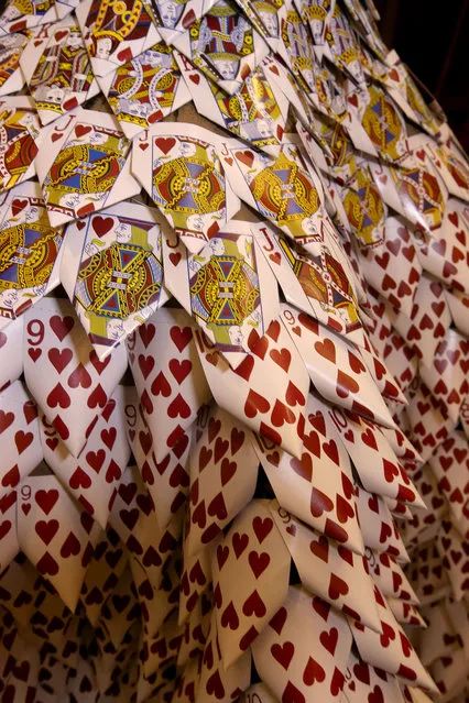 In this photo taken Thursday, February 5, 2015, shows a detail of a dress created by Marjorie Taylor, co-owner of Velvet Edge in Eugene, Ore. The dress is constructed from recycled casino cards and is on display at her boutique in celebration of Valentine's Day. (Photo by Chris Pietsch/AP Photo/The Register-Guard)