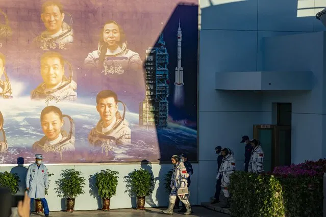 Chinese astronauts prepare to depart on the Shenzhou-12 mission at the Jiuquan Satellite Launch Center in Jiuquan in northwestern China, Thursday, June 17, 2021. Adding a crew to China's new orbiting space station is another major advance for the burgeoning space power. (Photo by Ng Han Guan/AP Photo)