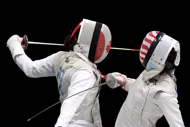 Lee Kiefer of Team United States competes against Jessica Zi Jia Guo of Team Canada on Fencing - Women's Foil Individual at Parque Deportivo Panamericano on Day 10 of Santiago 2023 Pan Am Games on October 30, 2023 in Santiago, Chile. (Photo by Ezra Shaw/Getty Images)