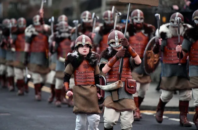 Members of the Jarl Squad march through the streets of Lerwick on January 31, 2017 in the Shetland Islands, Scotland. (Photo by Jeff J. Mitchell/Getty Images)