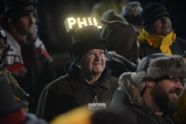 Barry Edwards of Lancaster, PA, wears a homemade lighted Phil hat at Gobbler's Knob on the 131st Groundhog Day in Punxsutawney, Pennsylvania, U.S. February 2, 2017. Punxsutawney Phil, a famed U.S. groundhog emerged from his burrow on Thursday and predicted six more weeks of winter weather. (Photo by Alan Freed/Reuters)