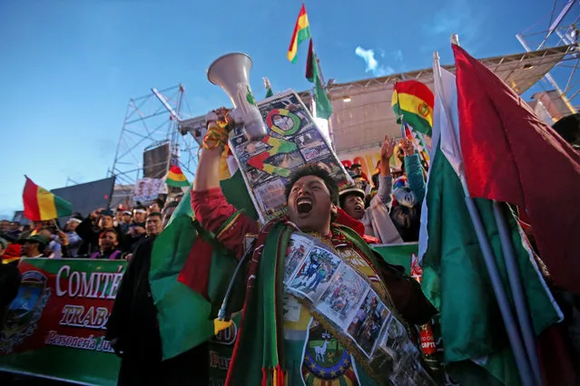 Demonstrators take part in a march against the re-election of Bolivian President Evo Morales in La Paz, Bolivia, 21 February 2017. (Photo by Martin Alipaz/EPA)