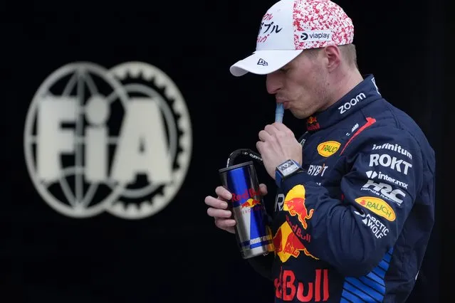 Pole position Red Bull driver Max Verstappen of the Netherlands drinks after the qualifying session at the Suzuka Circuit in Suzuka, central Japan, Saturday, April 6, 2024, ahead of Sunday's Japanese Formula One Grand Prix. (Photo by Hiro Komae/AP Photo)