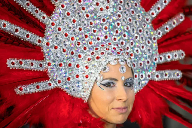 Desire Henriquez Quintana poses wearing a creation called “Blowing in the wind” before the start of Las Palmas' Carnival Queen ceremony in Las Palmas, Spanish Canary Island of Gran Canaria, February 24, 2017. (Photo by Borja Suarez/Reuters)