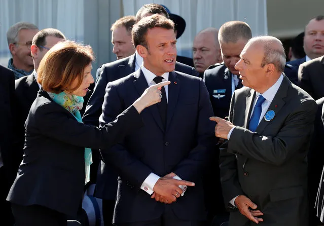 French President Emmanuel Macron, French Defence Minister Florence Parly and Eric Trappier, Chairman and CEO of Dassault Aviation, attend the 53rd International Paris Air Show at Le Bourget Airport near Paris, France, June 17, 2019. (Photo by Benoit Tessier/Pool via Reuters)