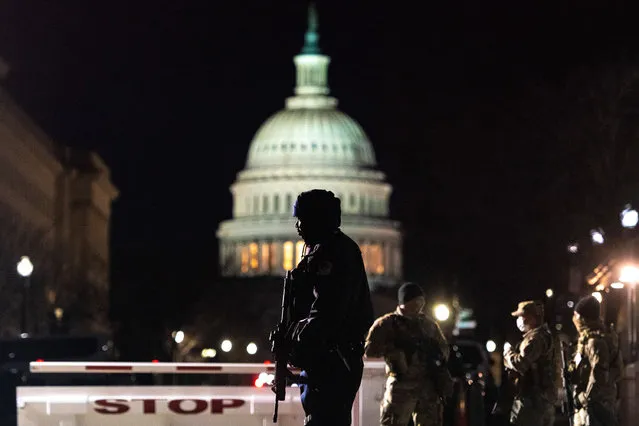 Members of the National Guard protect the perimeter around the Capitol Building during the preparation for the United States Presidential Inauguration in Washington DC, USA on January 16, 2021. (Photo by Chris Tuite/ImageSPACE/Rex Features/Shutterstock)