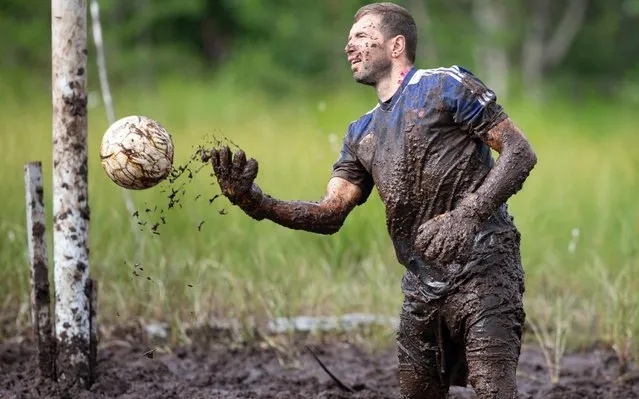 The goalkeeper in action during the Swamp Soccer Championships 2019 in Hyrynsalmi, Finland, 19 July 2019. (Photo by Tomi Hanninen/EPA/EFE/Rex Features/Shutterstock)