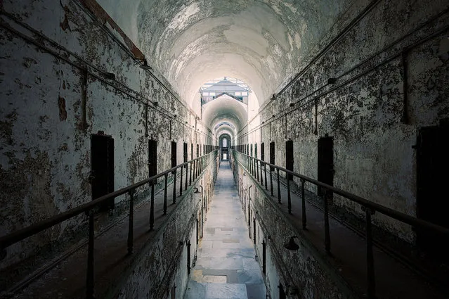 Cell block of a Eastern State Penitentiary in Philadelphia, Pa. These creepy pictures of abandoned asylums, prisons and schools give a sense of what life was like in the institutions of 20th century America. (Photo by Daniel Barter/Caters News)